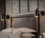 IronArm - Adjustable Wall Lamp with Wrought Iron Shade and Cylindrical Arm