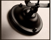 IronArm - Adjustable Wall Lamp with Wrought Iron Shade and Cylindrical Arm