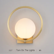 GlowSphere - Modern wall lamp with round glass globe and 1 light point